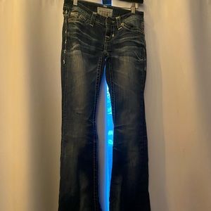 Big star dark jeans.